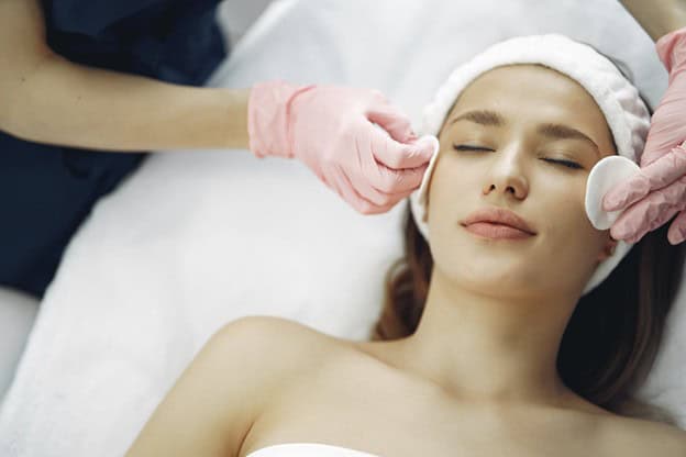 Woman getting a facial